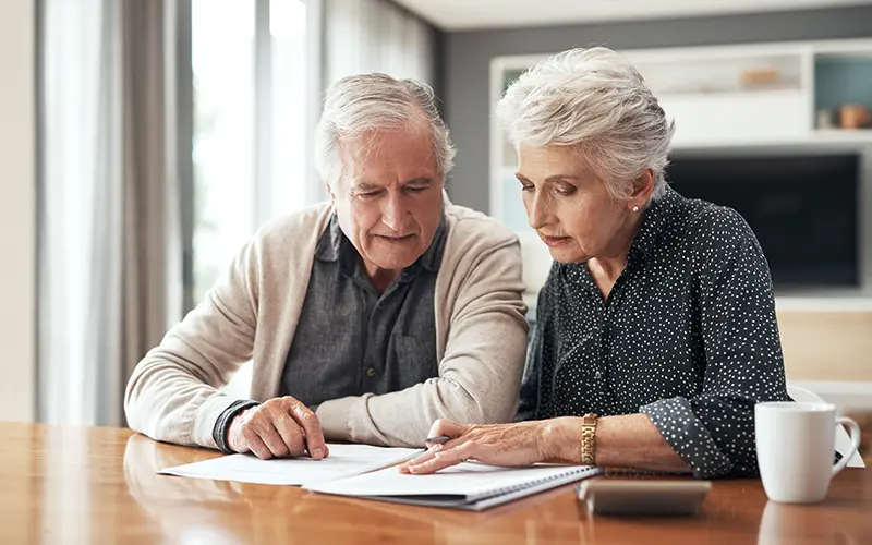 elderly couple discussing their living will